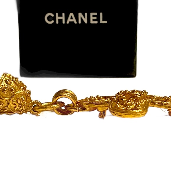 CHANEL Vintage CC Logo Large Gold Tone Cross Brooch  CHANEL: RARE Vintage Gold-tone CC Logo Cross with Bell Motif Brooch (1994)
